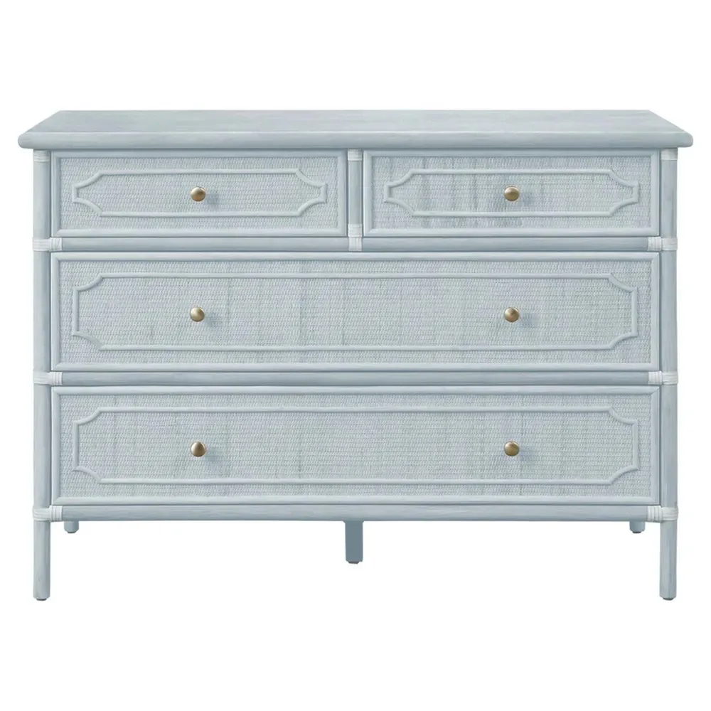Woven rattan dresser in a light blue finish