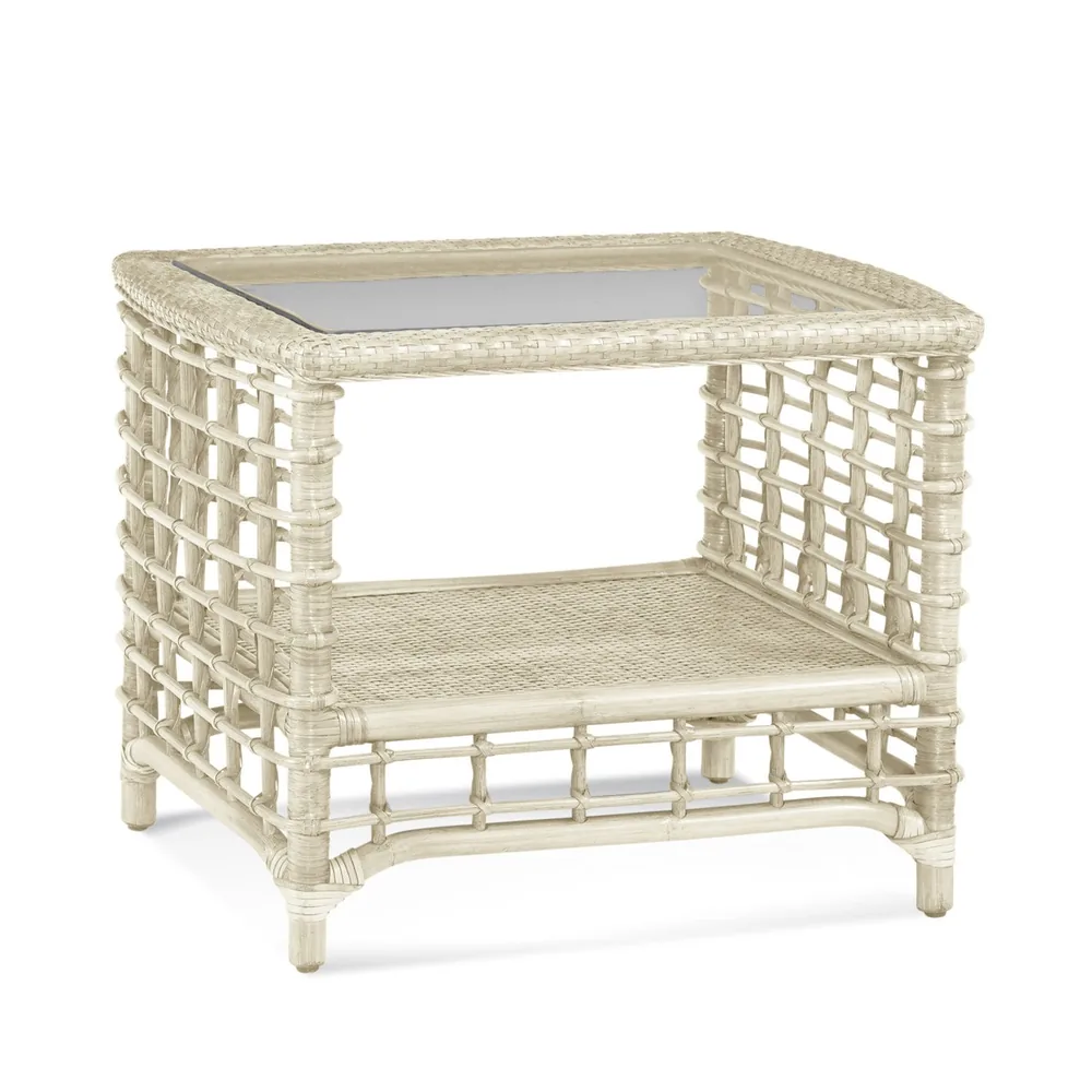 Relaxed coastal end table in a pale finish