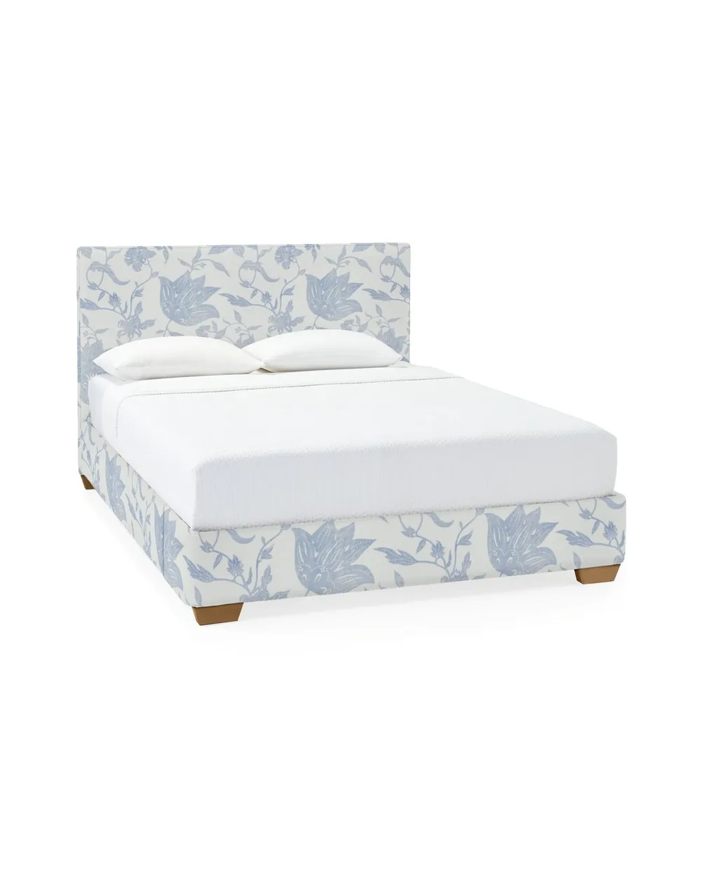 Upholstered bed with a quiet, low headboard
